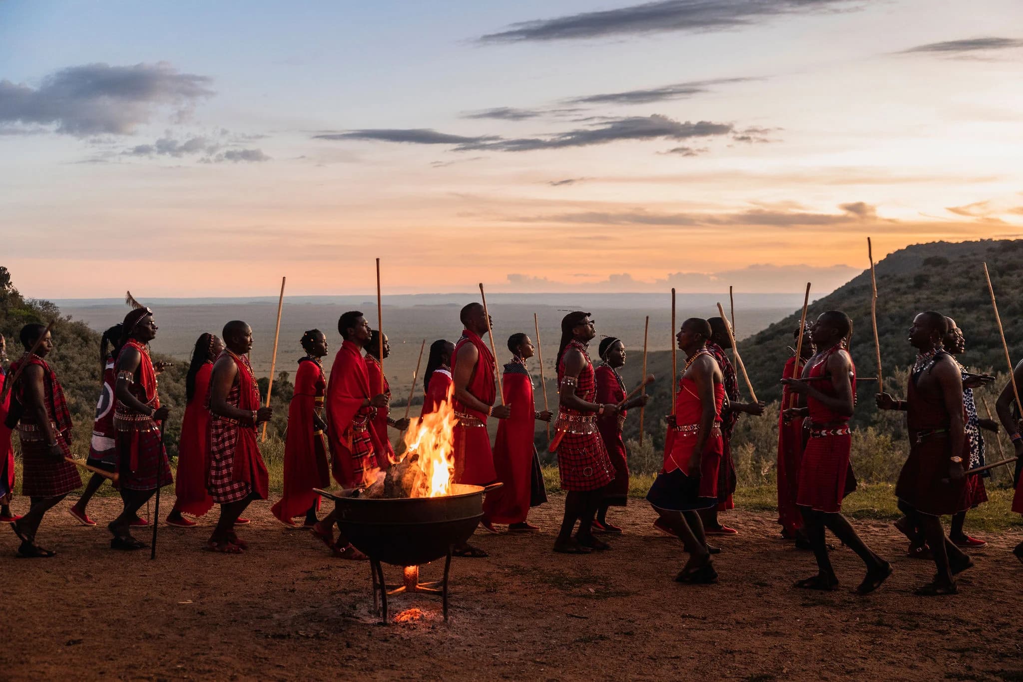 The Boma at Angama Mara — Maasai guides and firelight — Photo: Angama / Teagan Cunniffe