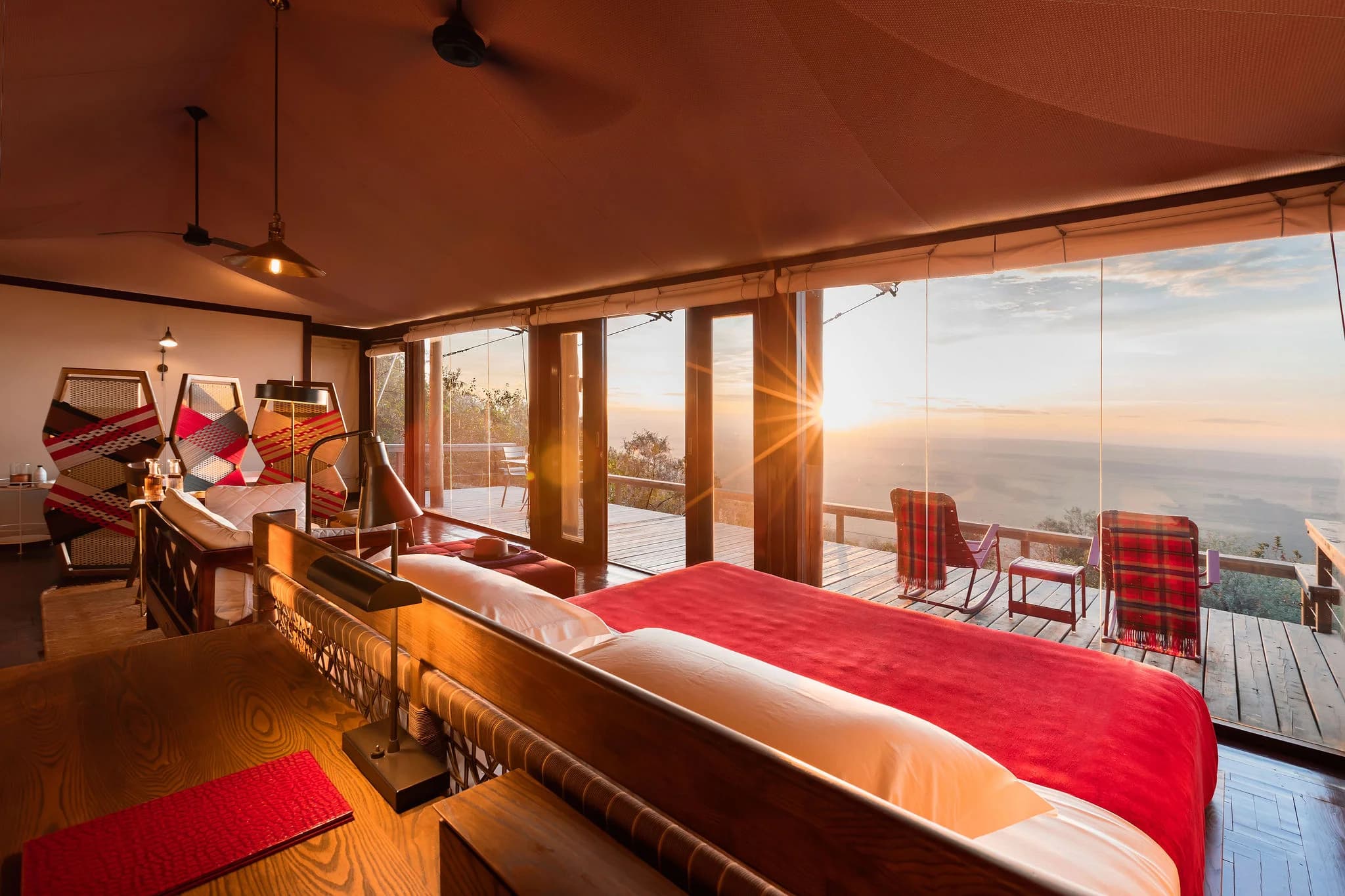 Suite interior at Angama Mara, with views over the Great Rift Valley — Photo: Angama / Teagan Cunniffe
