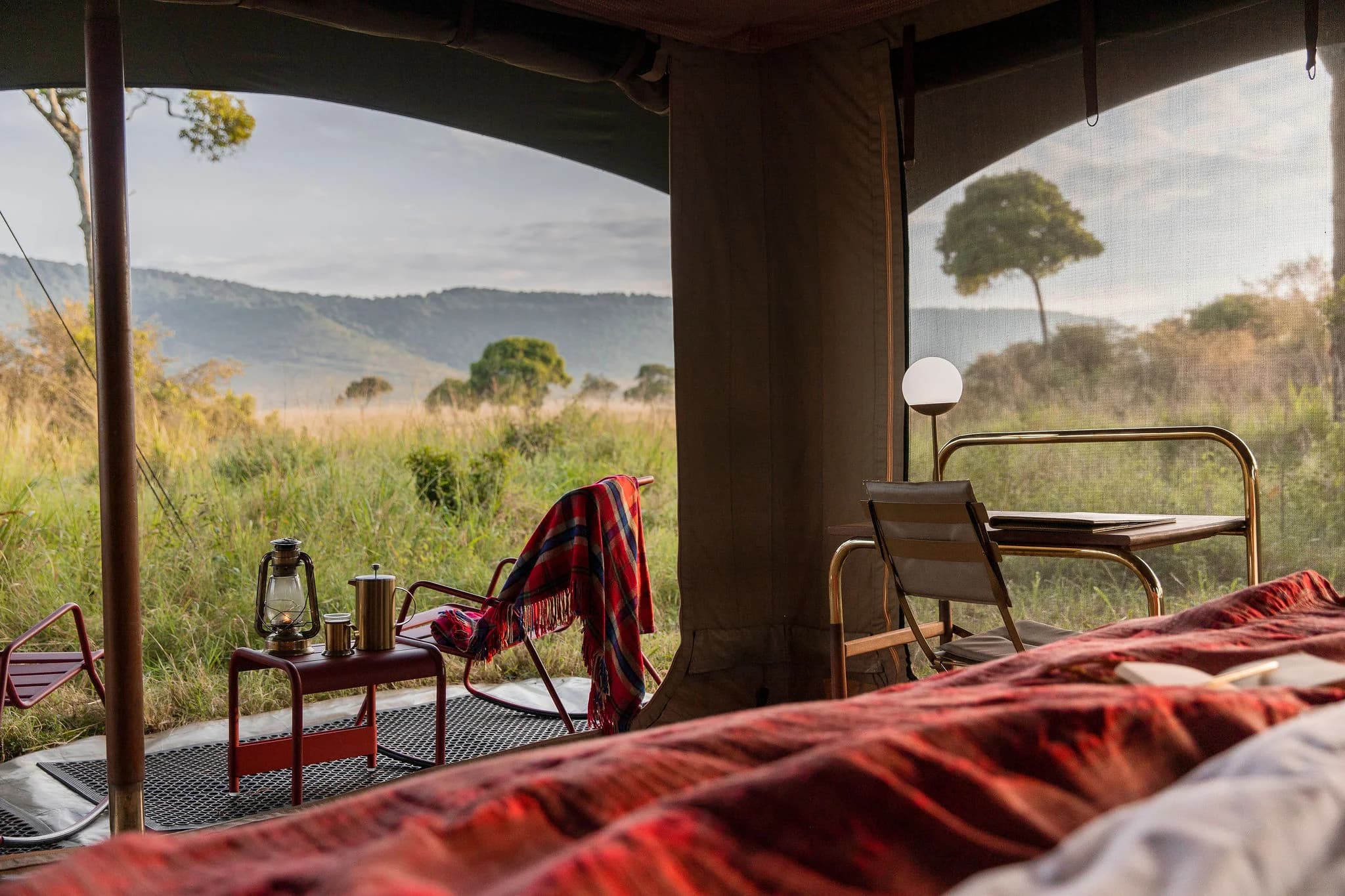 View from Angama Safari Camp across the Mara North Conservancy — Photo: Angama / Teagan Cunniffe
