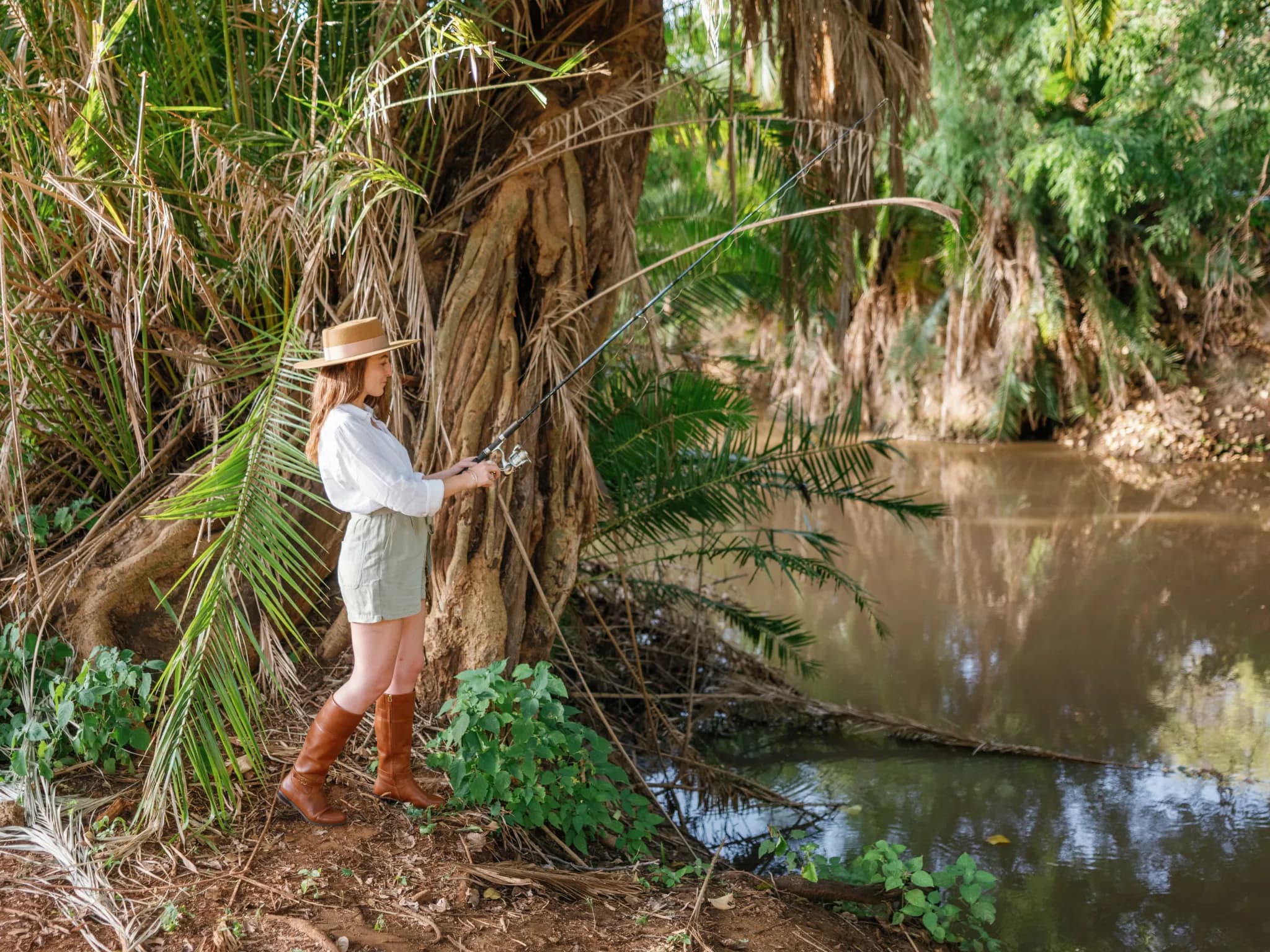 A guest fishing on one of Meru's permanent rivers — Photo: Elewana Collection / Oliver Fly Photography