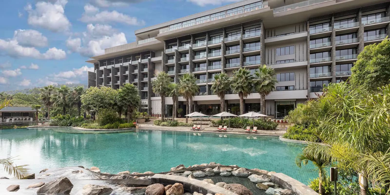 Gran Meliá Arusha's pool set against the tropical gardens