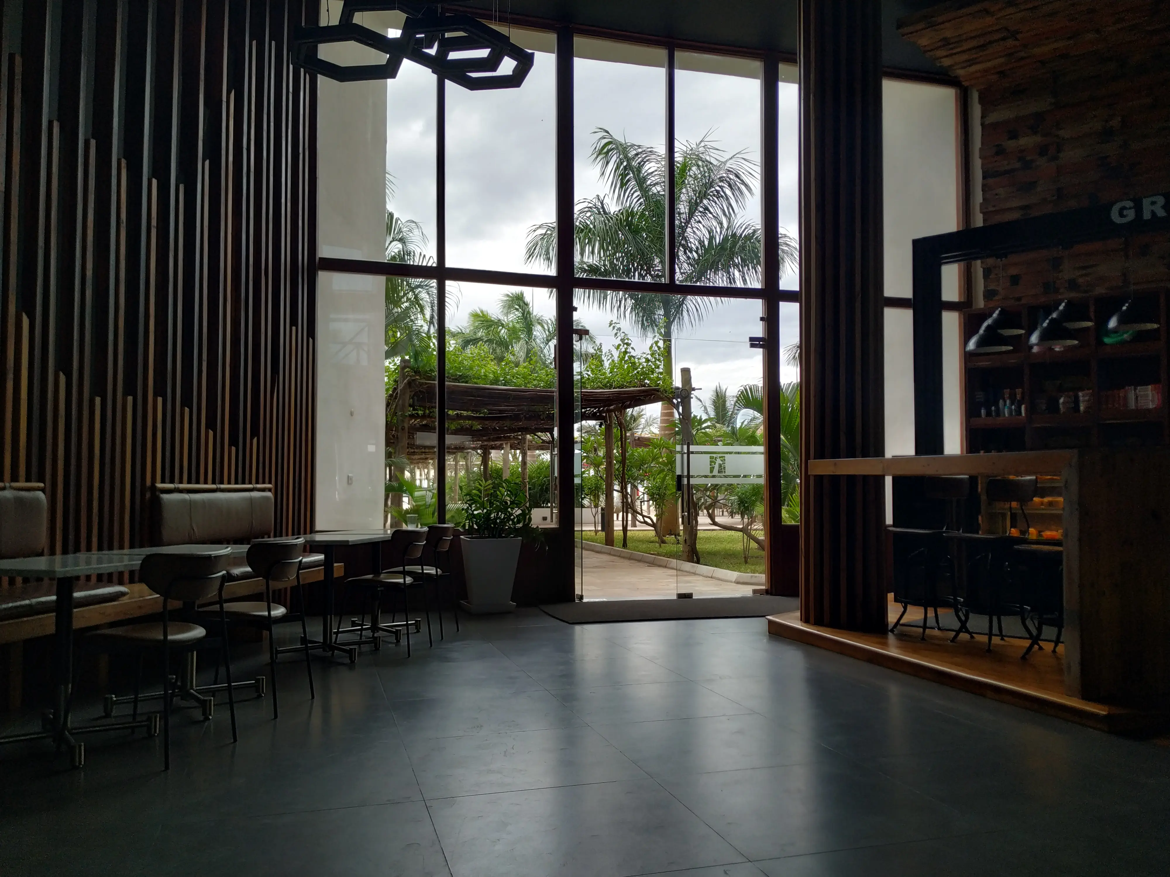 The modern, glass-walled lobby of Hotel Giraffe