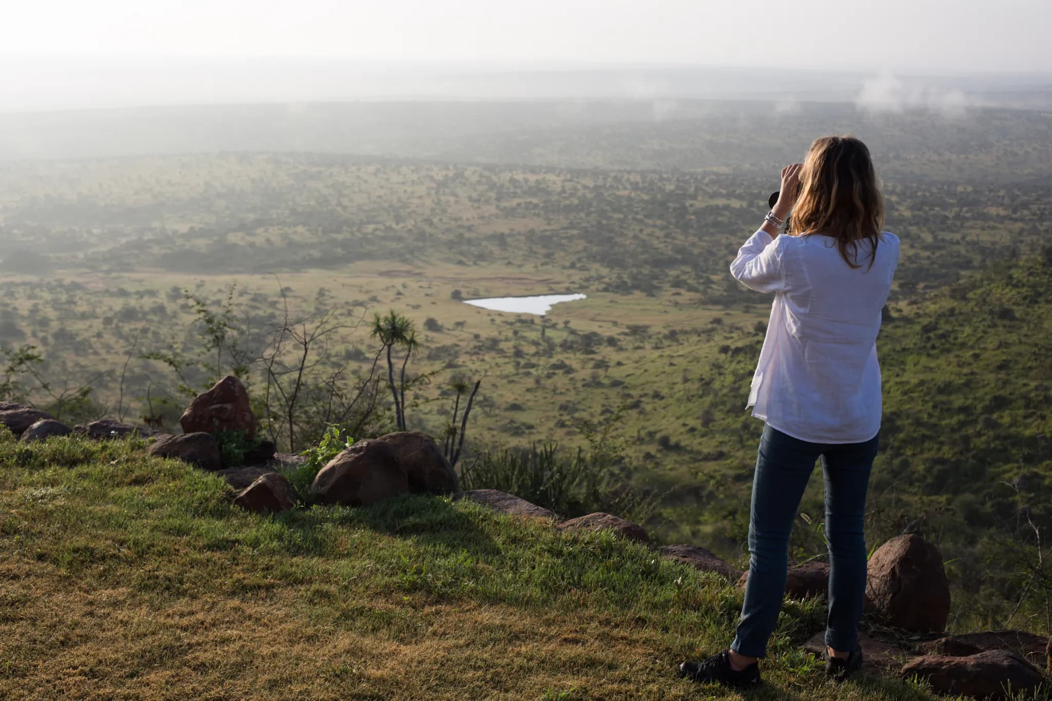 The escarpment edge at Loisaba, the Laikipia plateau falling away toward Mount Kenya — Photo: Elewana Collection