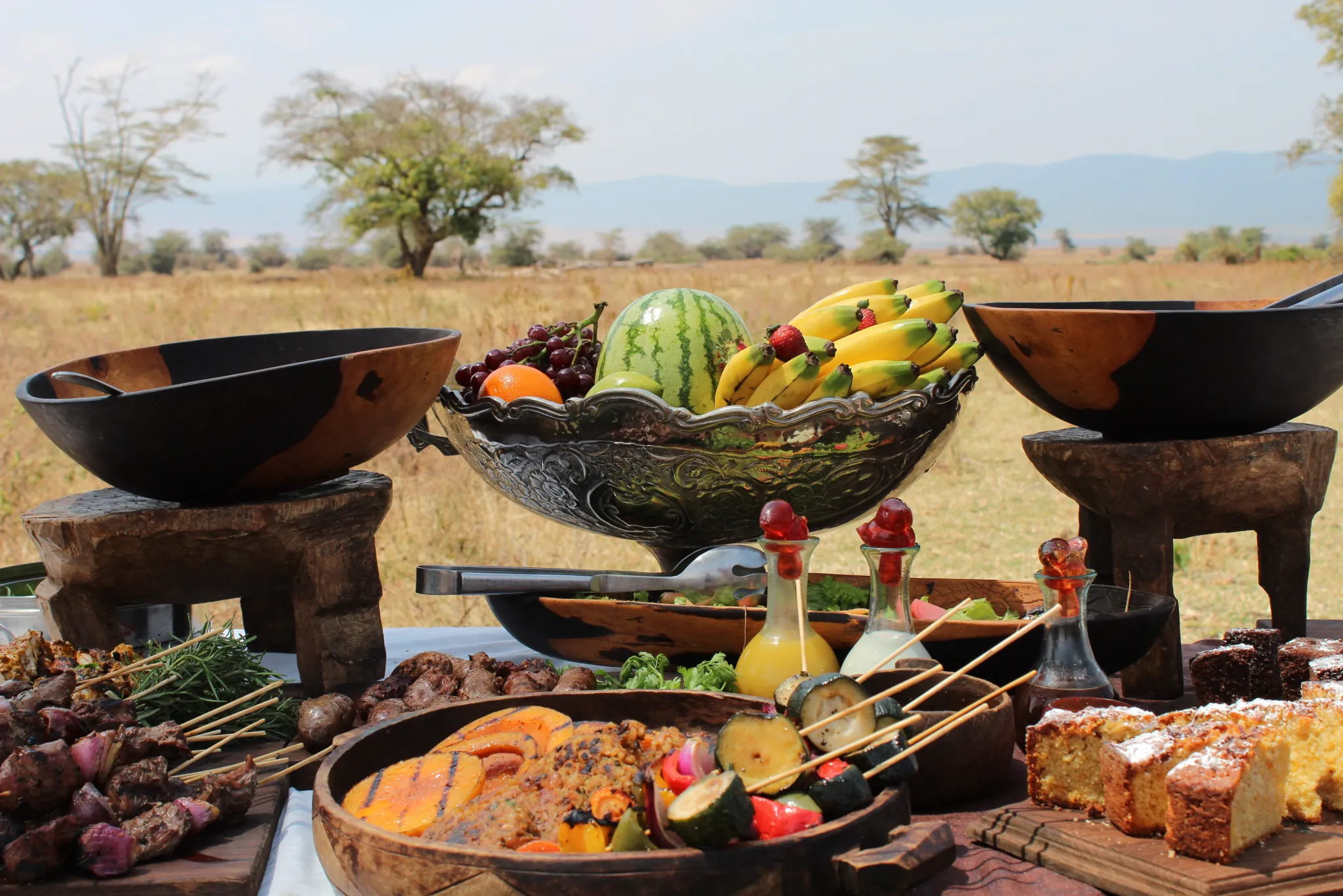 A private bush banquet set up on the crater floor — Photo: Elewana Collection