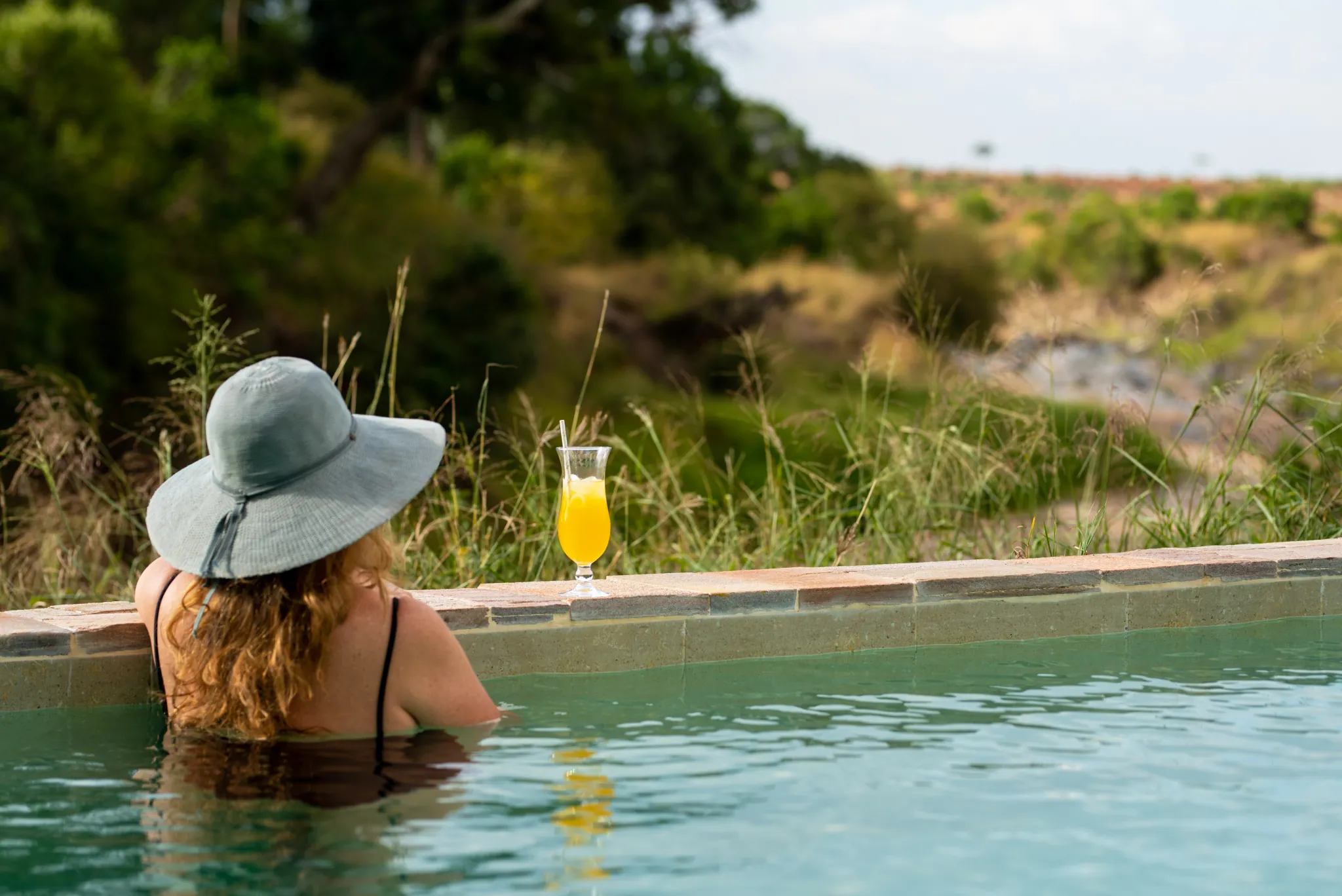 The infinity pool at Sand River, looking out over the river valley — Photo: Elewana Collection / Silverless
